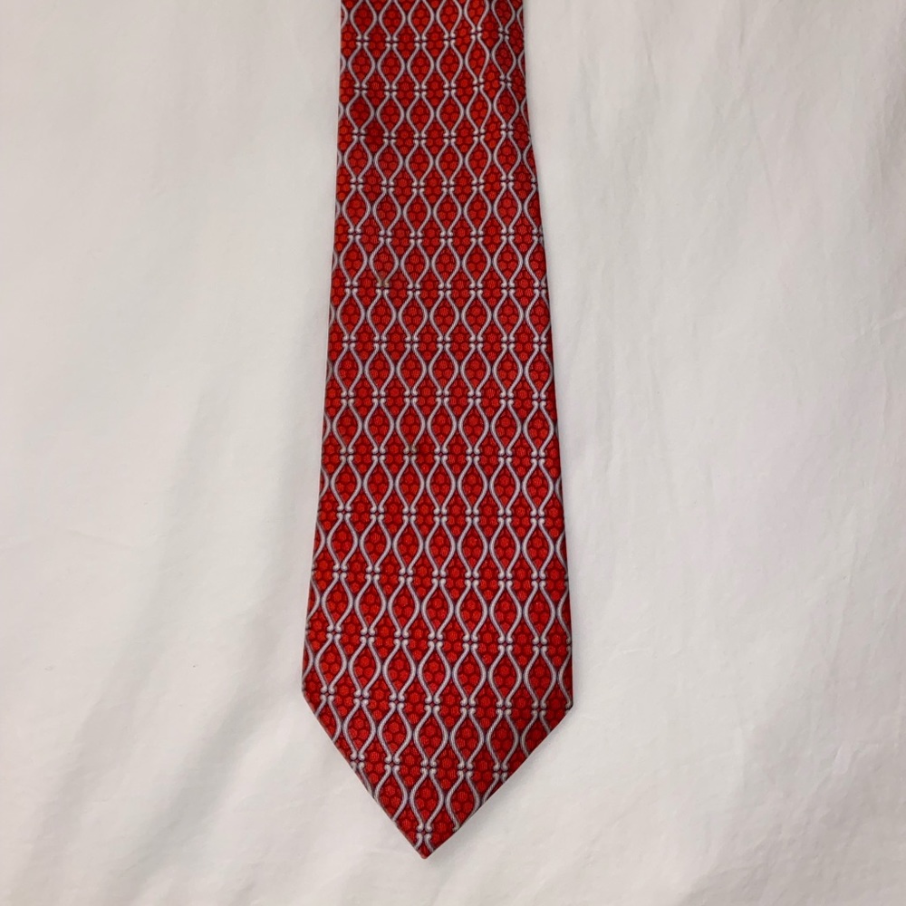 Hermes mens red 100% silk tie with silver geometric honeycomb pattern